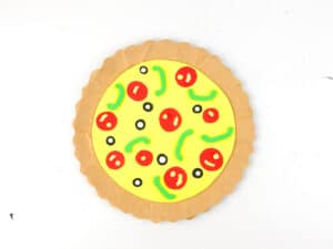 glue olives to paper pizza
