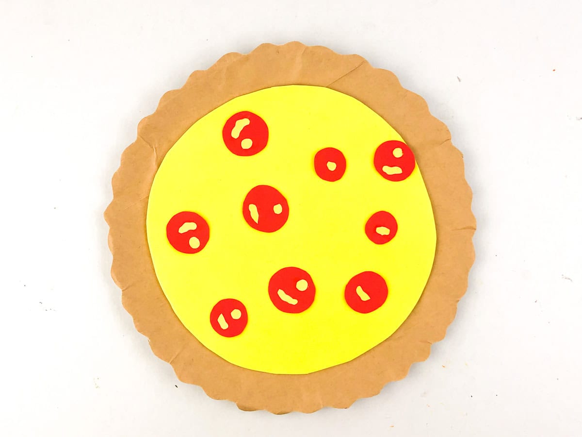 glue pepperonis to paper pizza craft