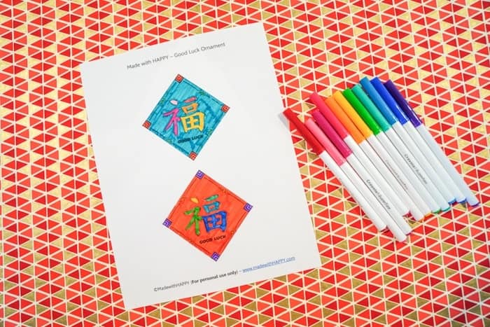 Good Luck in the New Year. Good Luck Ornaments. Chinese New Year Kids Craft. Free Printable Chinese New Year Craft. Chinese New Year Good Luck Ornament. How to make a good luck ornament. Celebrate the Chinese New Year with these simple crafts.