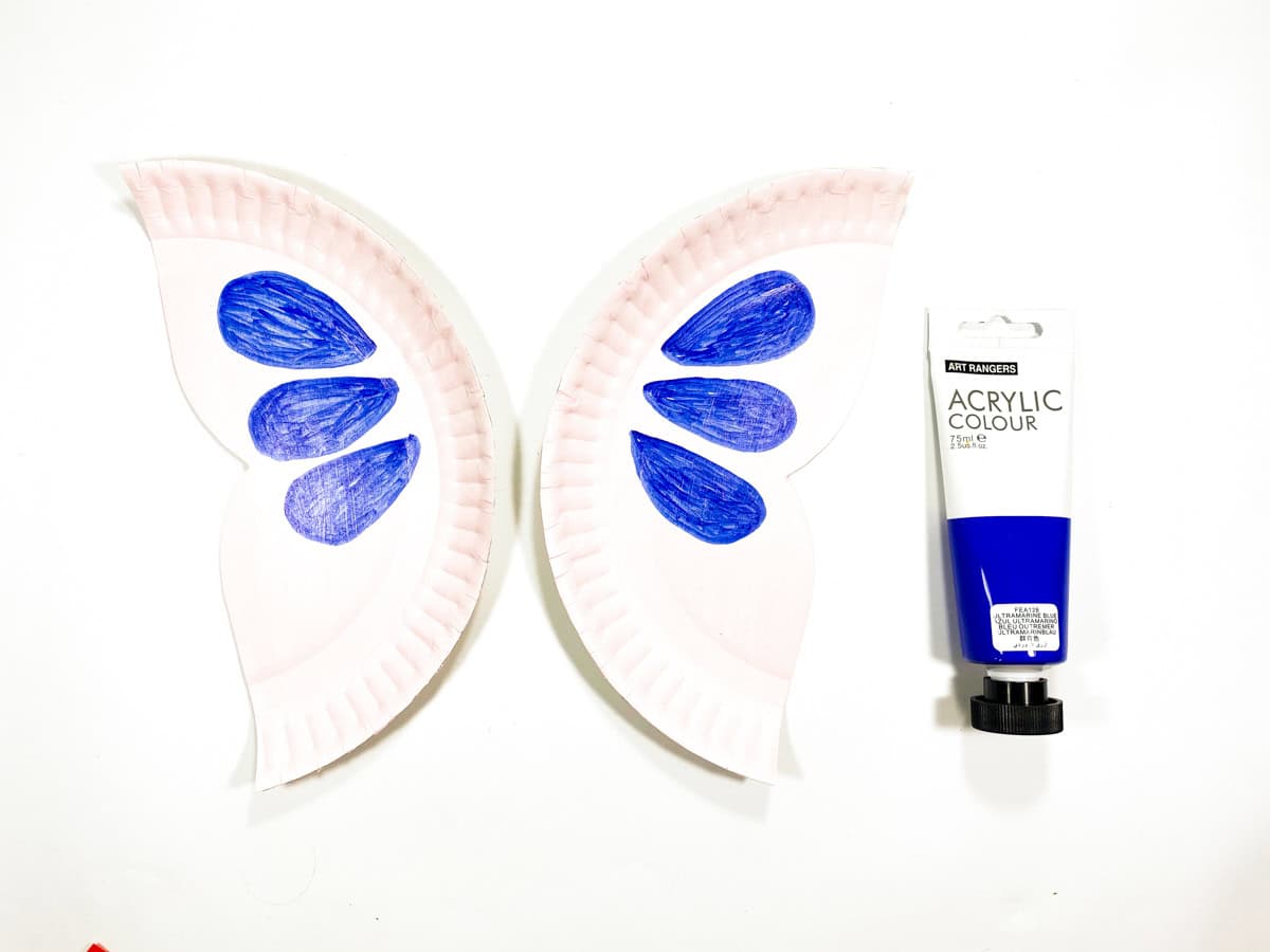 paint blue tear drops on paper plate butterfly wings