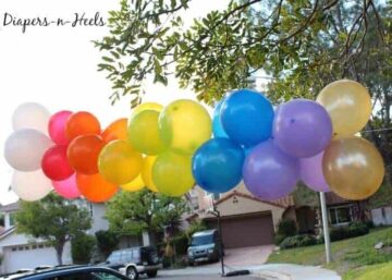 spiral rainbow balloon arch