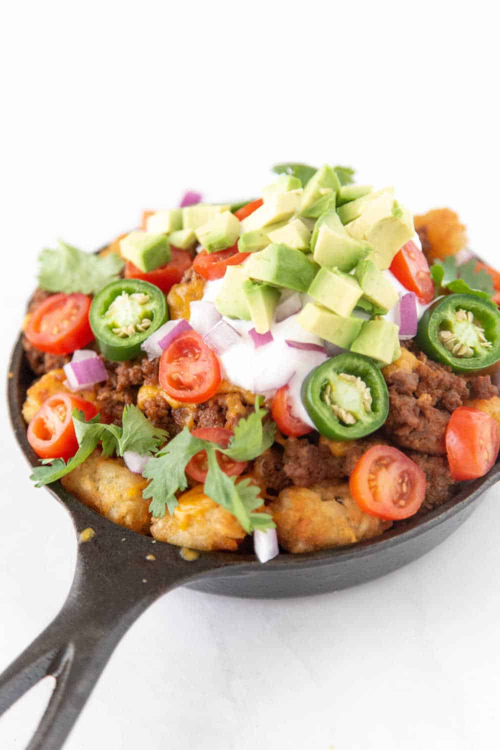 Loaded Tater Tot Nachos Recipe - Made with HAPPY