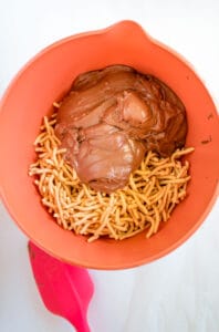 mix chocolate peanut butter mixture with chow mein noodles